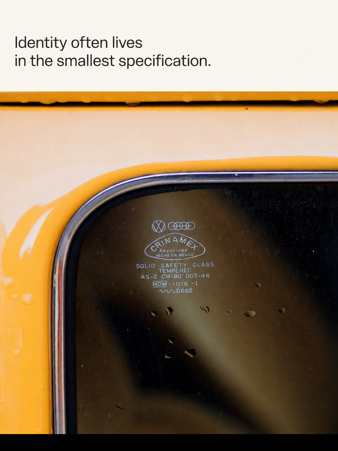 Safety-glass marking with an observation about identity and specification.