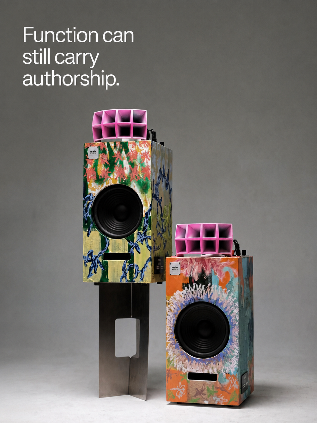 Painted Main Audio speakers with an observation about function carrying authorship.