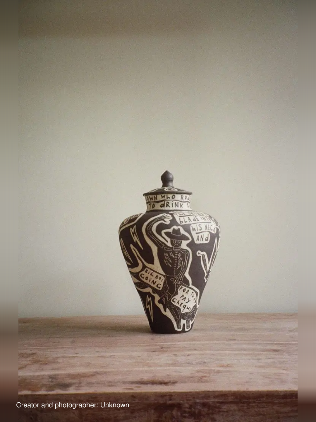 Illustrated lidded vessel